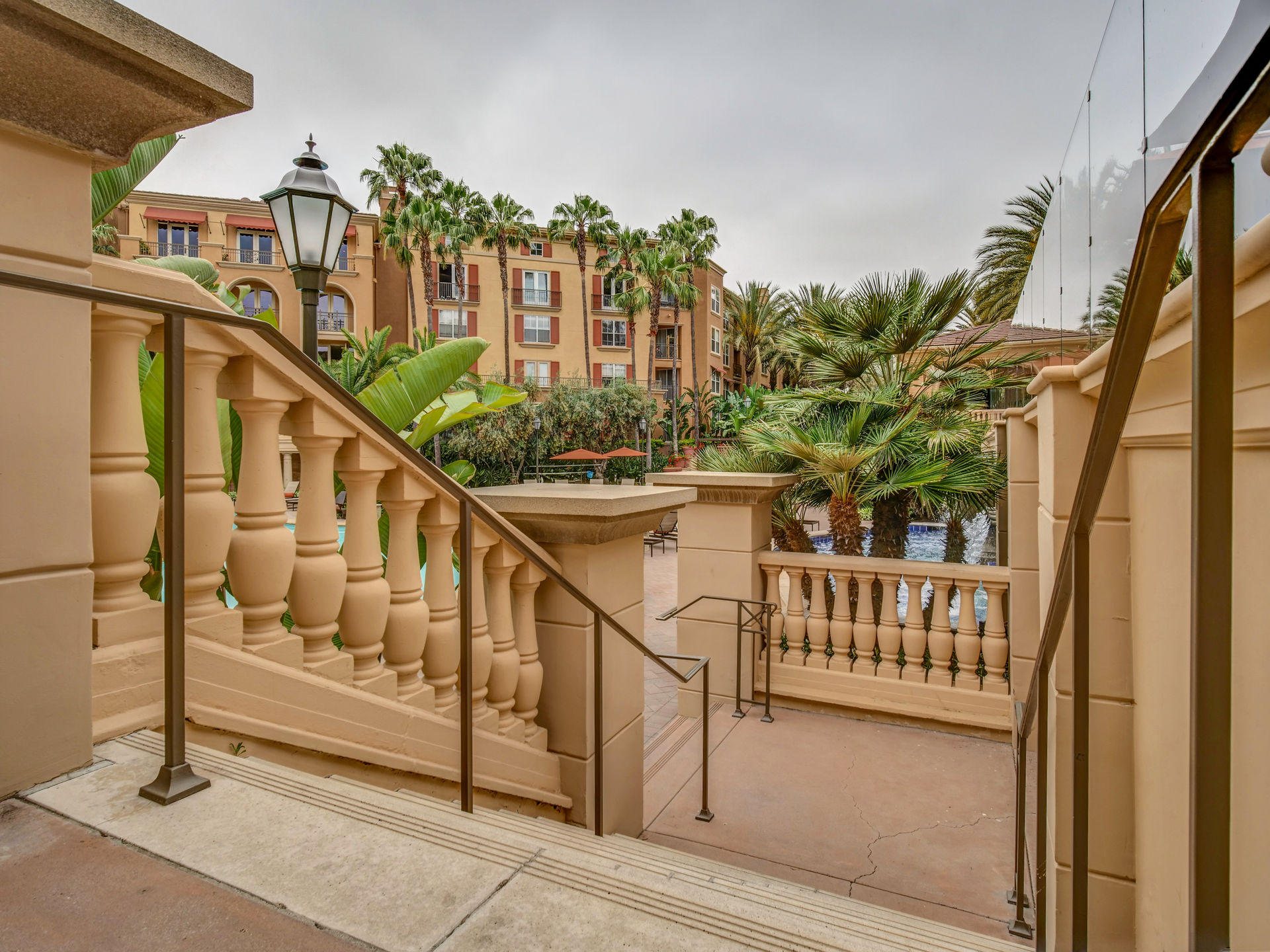 Villa Siena Apartment Homes stairway overlooking the pool